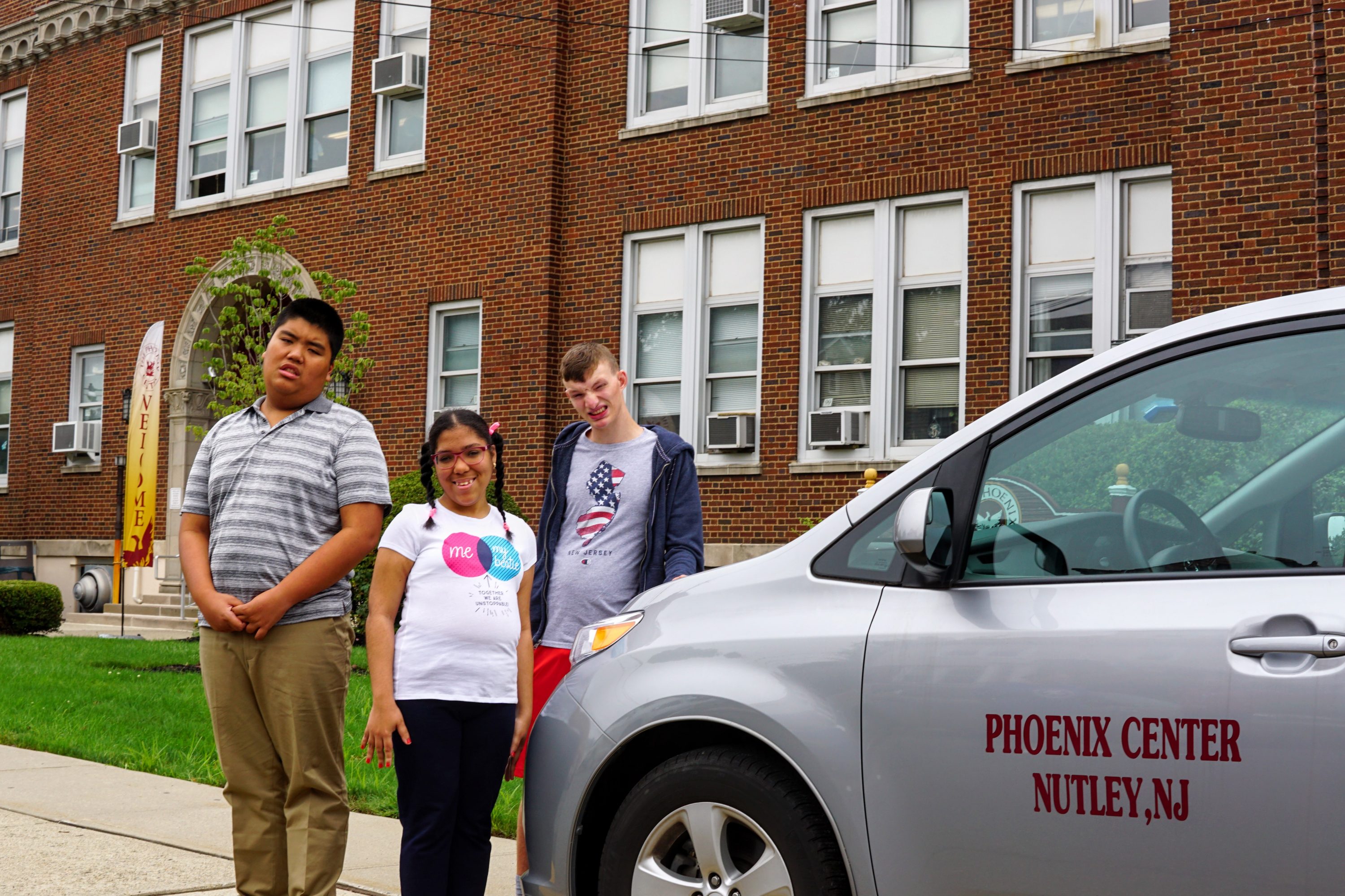 TPC Students next to school van