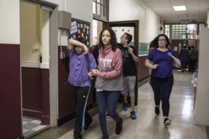 Students participating in evacuation drill